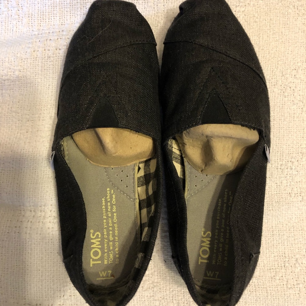 Toms size 7, black chambray.